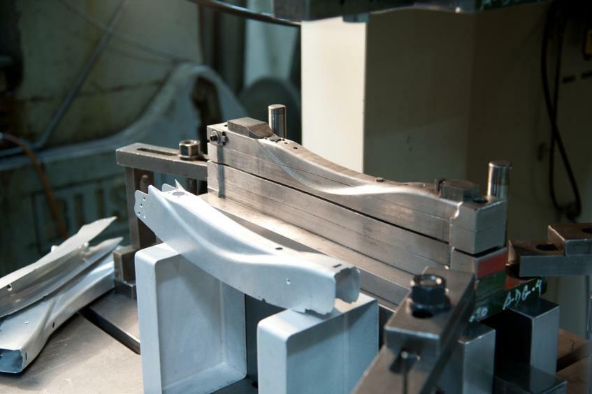 an image of Pacific Metal Stampings manufacturing pieces of metal in their in-house tool and die shop.